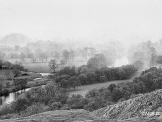 Snow shower over the river Tees near Middleton ion Teesdale