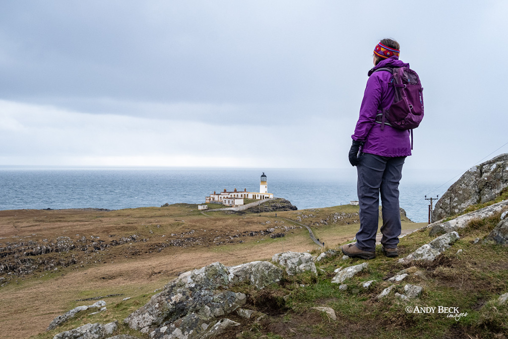 Walker at Neist Point Lighthouse, Isle of Skye, Scotland