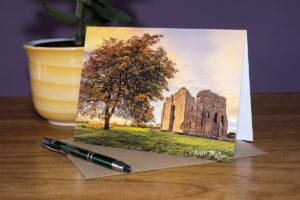 Bowes Castle in Autumn, Teesdale greeting card featuring Bowes village